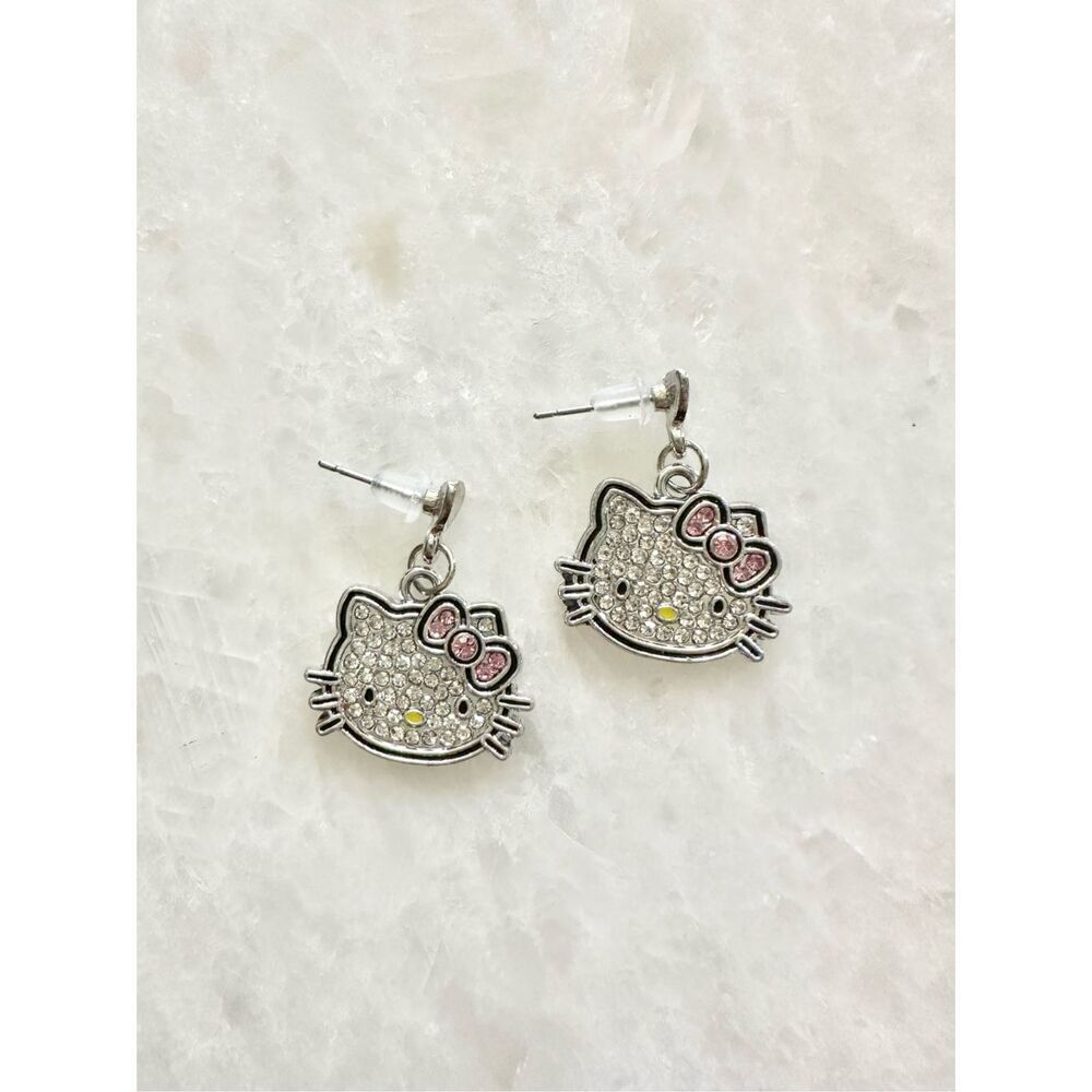 Hello Kitty sparkly dangle earrings with pink bow ￼
